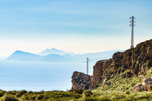 istock High voltage towers on spanish coast 1879691059