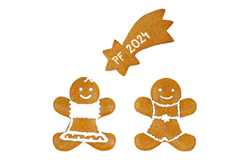Smiling gingerbread woman, man and comet with PF 2024 inscription, isolated on white background
