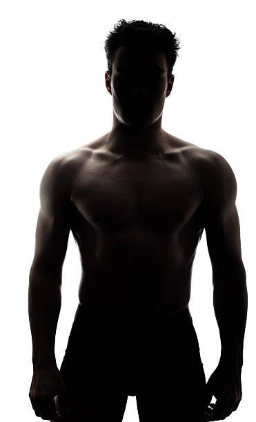 muscular man in silhouette - human muscle body building exercising black and white fotografías e imágenes de stock