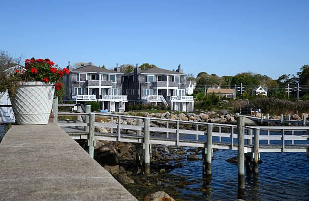 istock wood dock by townhomes 187974651