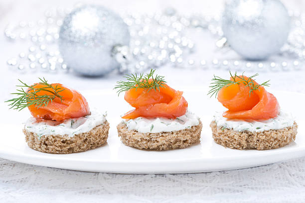 istock canape with rye bread, cream cheese, salmon and greens 187974743