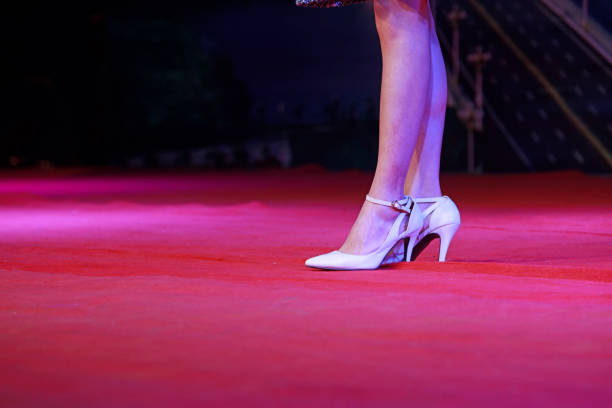 istock Beautiful legs and high heels on stage 1879755546