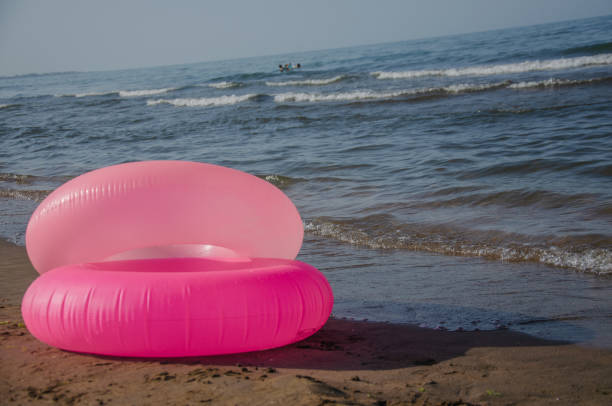 istock Children's swimming rings. Pink Inflatable Circles For Beach. 1879762282