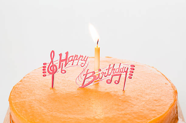 Birthday orange cake stock photo