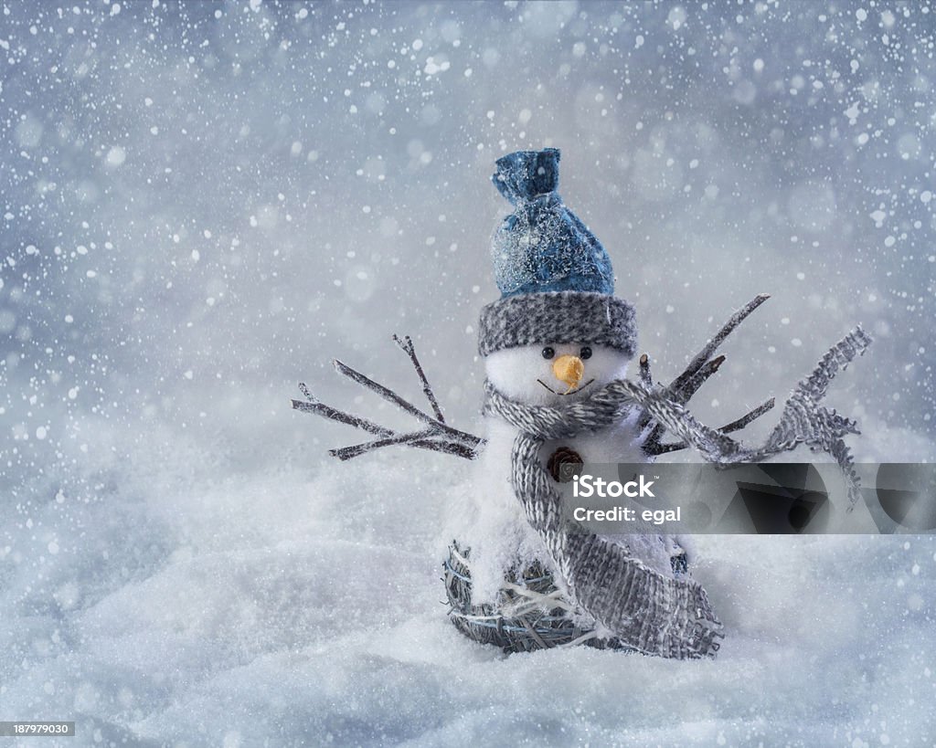 Smiling snowman Smiling snowman standing in the snow Snow Stock Photo