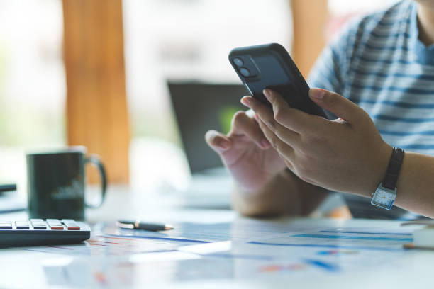 istock Beautiful businesswoman checking message on smartphone. Communication, connection, technology, business lifestyle concept. 1879802669