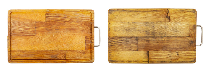 Old rectangular wooden cutting board, isolated on white background, full depth of field, top view. File contains clipping path.