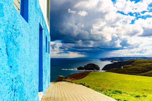Sea coast in north Spain. View from Faro de Cabo Penas to the Bay of Biscay. Seascape of Atlantic ocean and Asturias coastline.