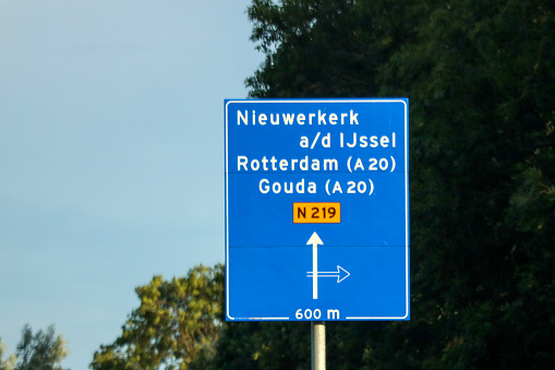 Road sign on provincial road N219 towards Nieuwerkerk aan den IJssel, Gouda and Rotterdam in the Netherlands