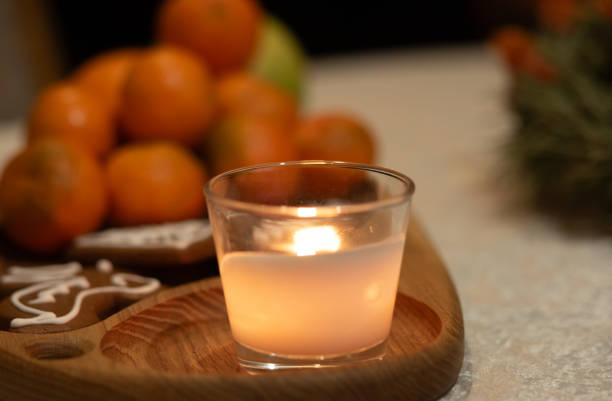 istock Christmas composition with candle and tangerines 1879879852