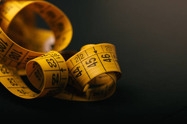 Tailor Yellow Measuring Tape stock photo