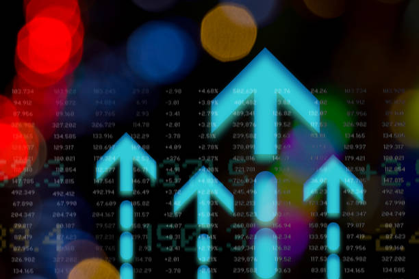 istock Fintech. Finance. Arrow Symbols and Data over Colourful Blurred Abstract Lights. Dark Background. 1879904655