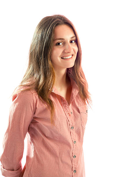 istock Smiling young woman posing and looking at camera 187990532