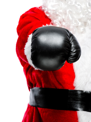 Santa's hand wearing boxing glove.Nikon D3X / D800. Converted from RAW.