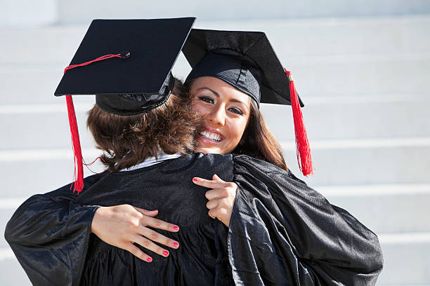 istock Happy graduate couple 187992516