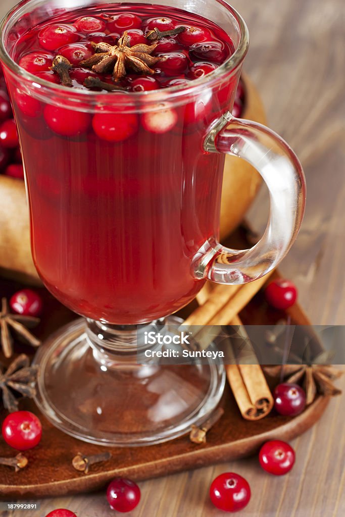 Hot mulled wine with berries Anise Stock Photo