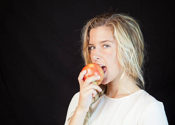 istock Teen Female Biting An Apple 187992956