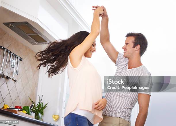 He Brings Out My Playful Side Stock Photo - Download Image Now - Dancing, Kitchen, Couple - Relationship