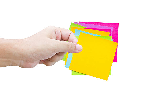 istock Asian man's hand hold the blank card isolated on white. 187993623