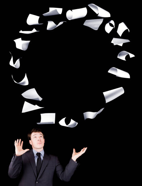 istock Businessman manipulating sheets of paper 187993903