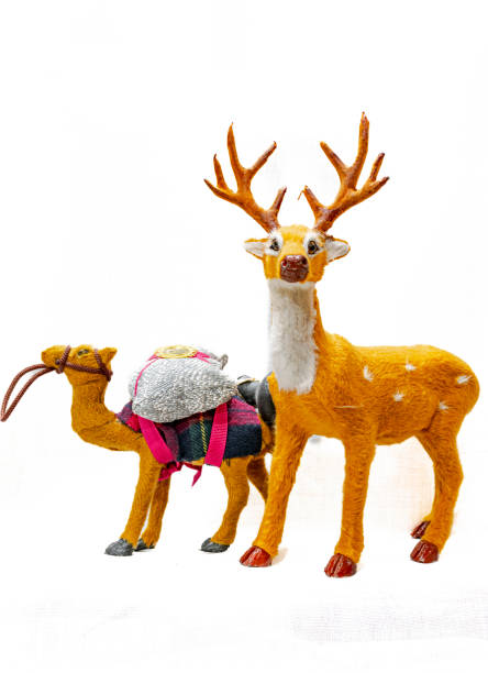 istock Two animals figurines of a dromedary and a reindeer 1879940164