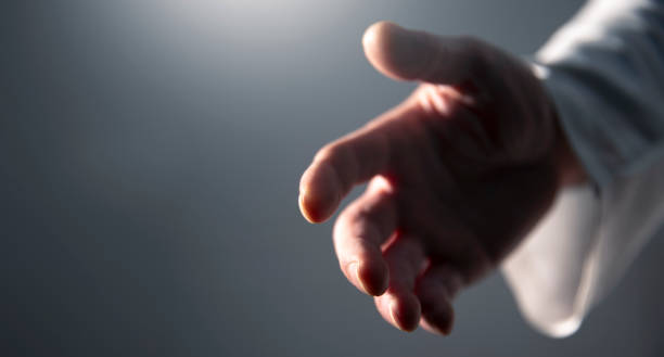 istock Hand of God or Jesus reaching 1879996478