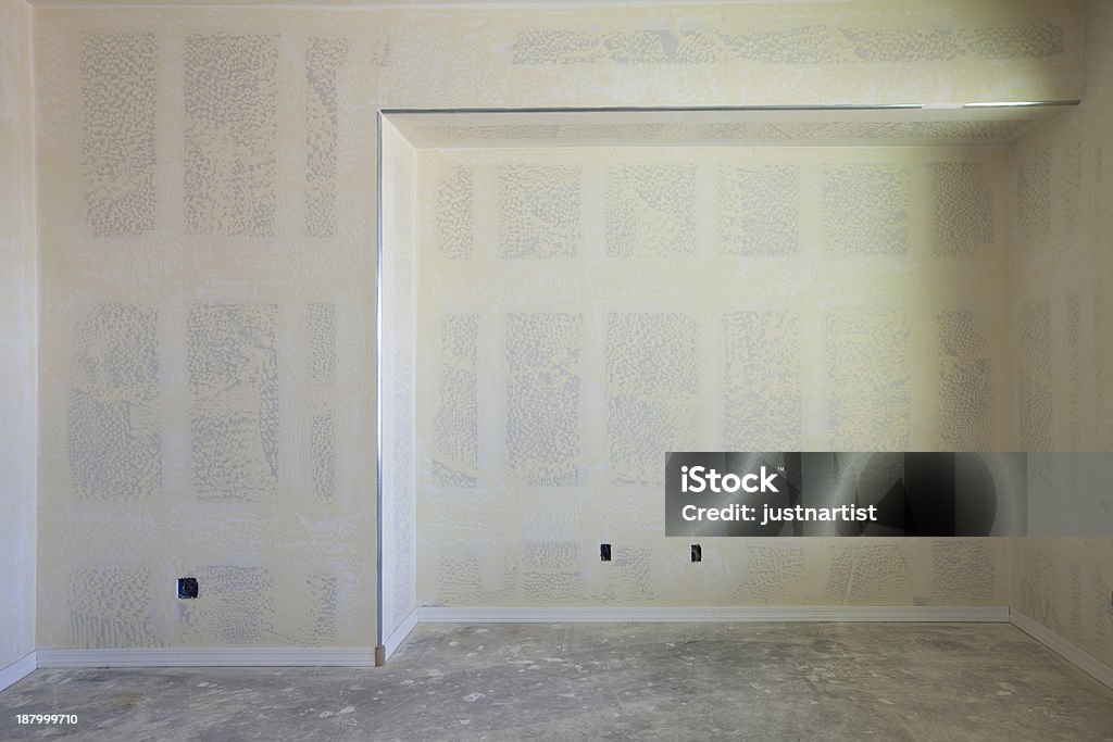 Drywall Construction of a New House Drywall Construction of a New House. Detail view of an entertainment wall in a living room. Built Structure Stock Photo