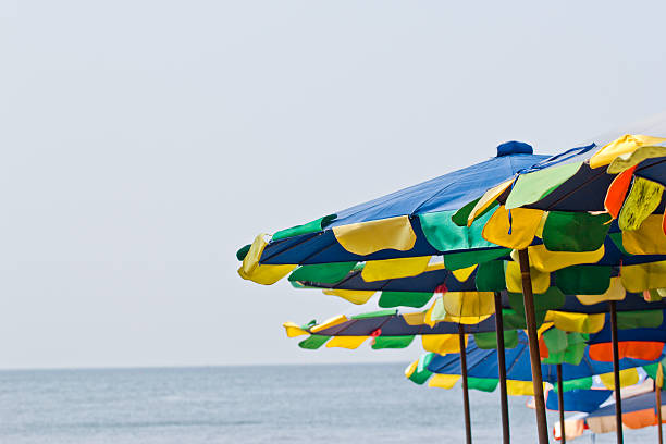 istock chairs and umbrella on stunning tropical beach 188001971