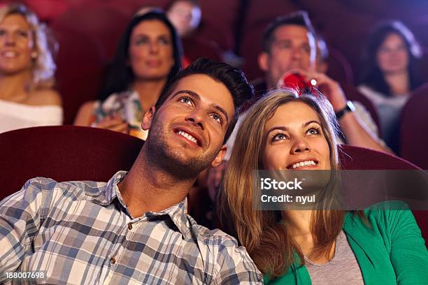 Happy Couple Watching Movie In Cinema Stock Photo - Download Image Now - 20-29 Years, 25-29 Years, Adult