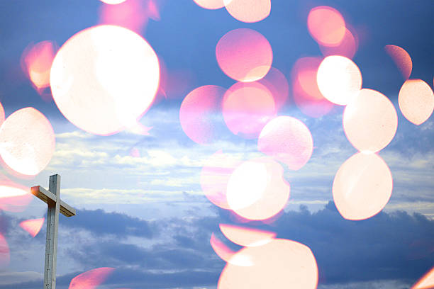 istock christian cross and heaven 188010814
