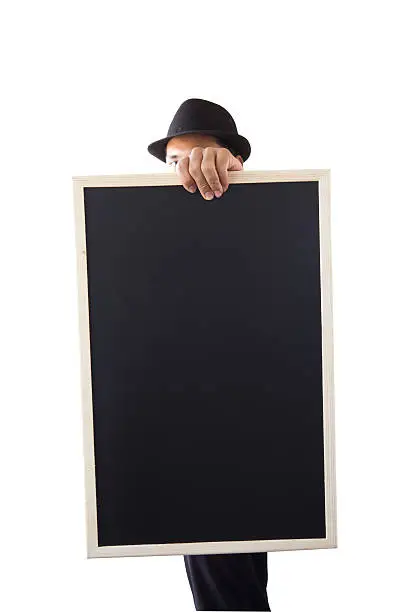 Businessman holding a blackboard in hands.