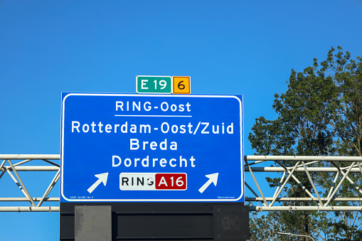 Direction sign on motorway A20 heading to Utrecht and Gouda with junction to A16 at Terbregseplein in the Netherlands