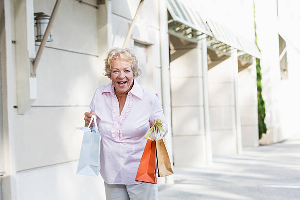 istock Senior woman shopping 188012809