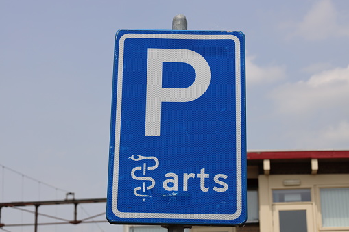 Sign that parking place is reserved for a doctor and other cars are not allowed in boskoop
