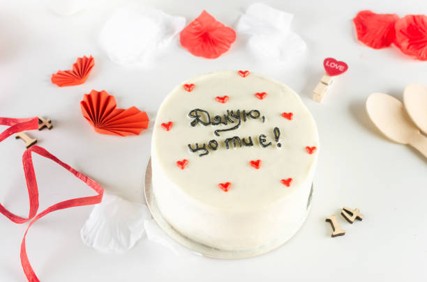 istock Trendy bento cake with cute decor on a light background. 1880140306