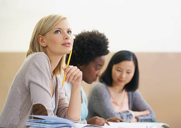 University college students having examination