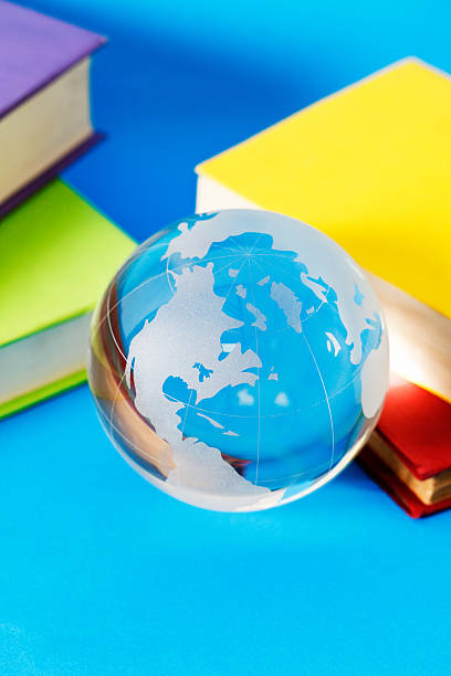 istock Crystal world globe paperweight with books 188016266