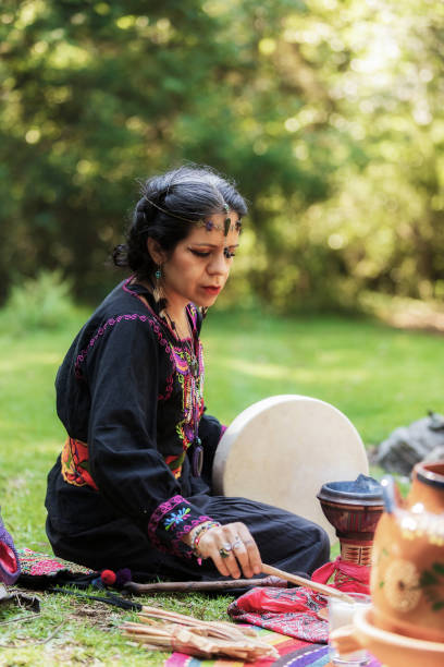 istock Mexican holistic healer lights a incense burner for a ritual II 1880165493