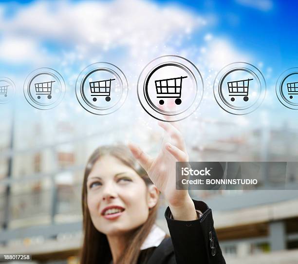 Businesswoman Pressing Symbol Of Modern Online Marketing And Shopping Stock Photo - Download Image Now