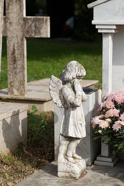 Marble Angel in cemetery stock photo