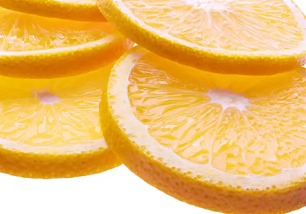 Background with citrus-fruit of orange slices. Closeup.