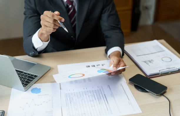 istock Business man working with laptop. Young business man thinking Concentrated at work. 1880197990