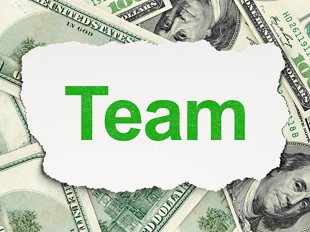 istock Torn paper with words Team on money background 188021038