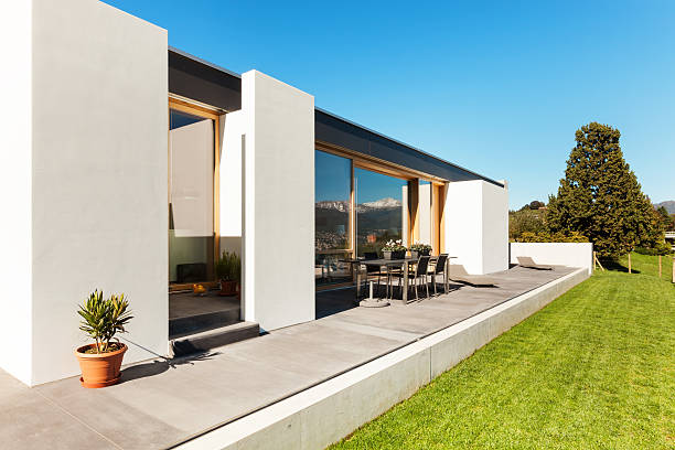 Exterior of a beautiful modern home with large windows