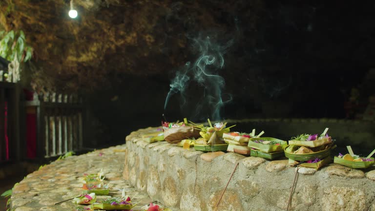 Daily offerings to Hindu God and burning aroma sticks outdoors