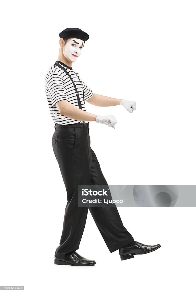 Male mime artist performing Full length portrait of a male mime artist performing isolated on white background Actor Stock Photo