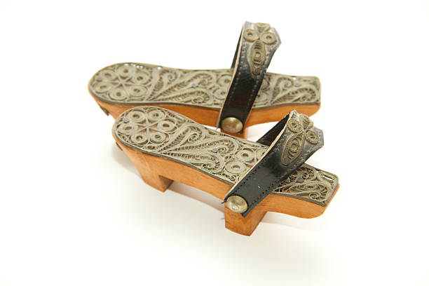 istock Small Turkish Traditional Wooden Shoes on white 188023718