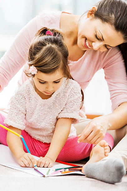 istock Smiling mother enjoying with her daughter. 188026820