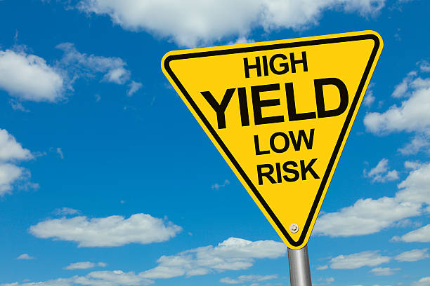 High Yield, Low Risk Road Sign High Yield, Low Risk Road Sign yield sign photos stock pictures, royalty-free photos & images