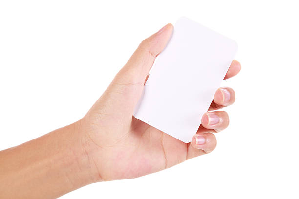 istock Hand holding business card on white background 188028198